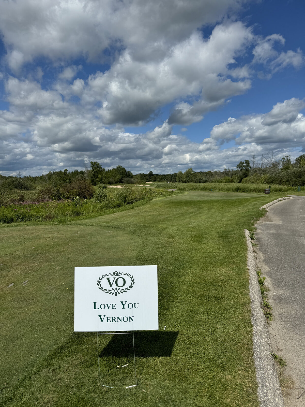 'Love You Vernon' sign on the course at The Bog